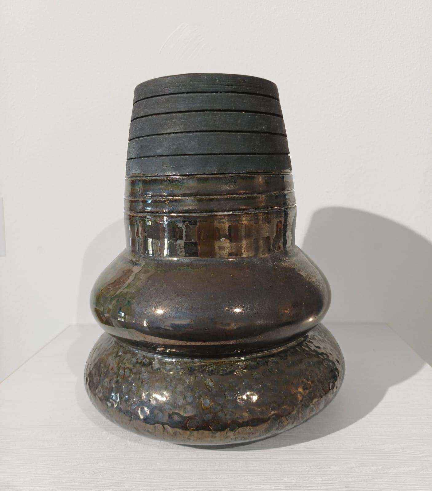 Metallic vessel 1